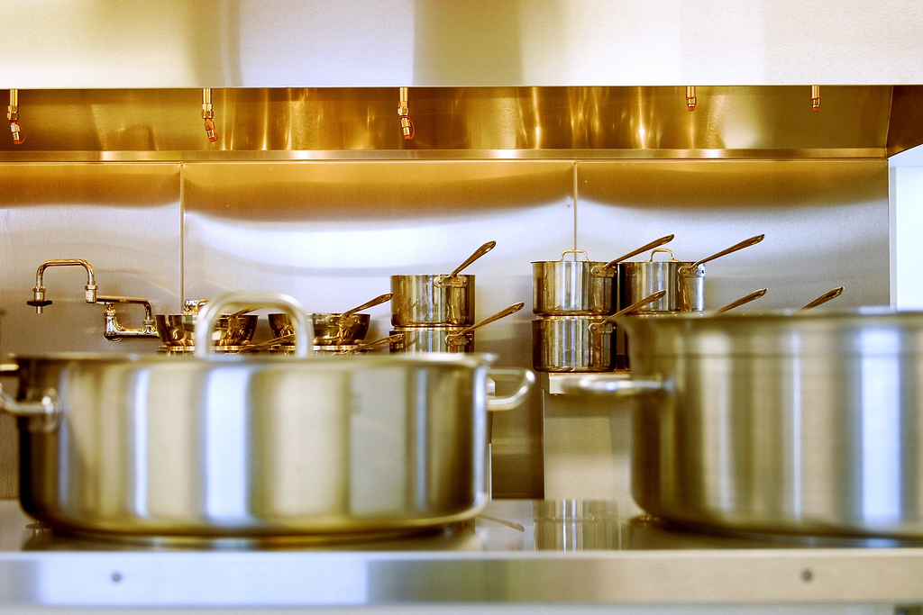 Best cookware: a set of stainless steel cookware in a professional kitchen