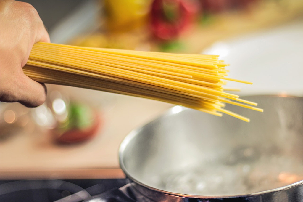 Best cookware: pasta going into a stainless steel stockpot