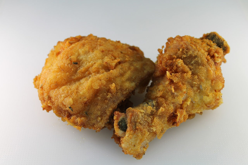 Skillet cooking: fried chicken drumsticks