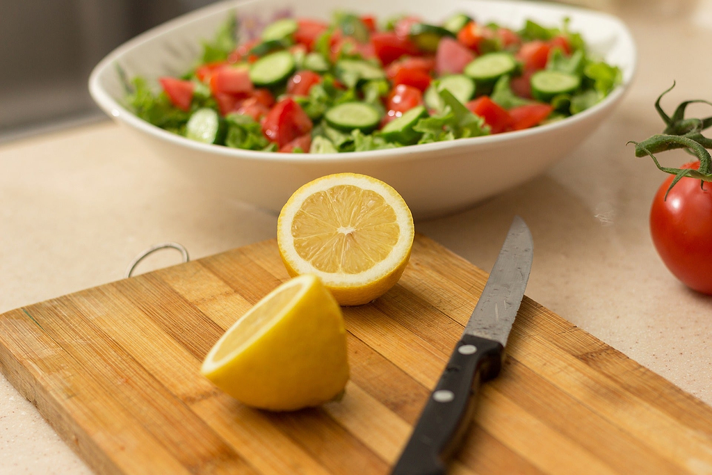 Kitchen knives: a pairing knife on cutting board
