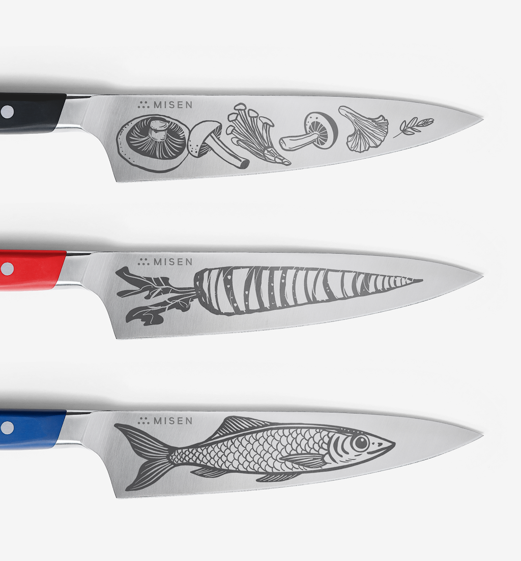 Misen kitchen knives with engraved mushroom, carrot, and fish illustrations on steel blades