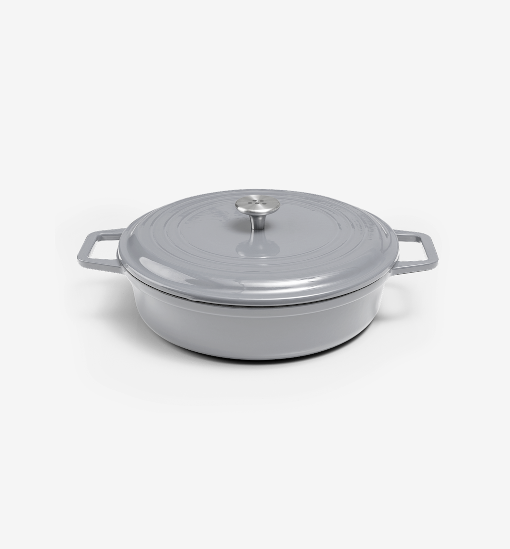 Grey enameled cast iron shallow casserole dish with lid and dual handles