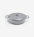 Grey enameled cast iron shallow casserole dish with lid and dual handles