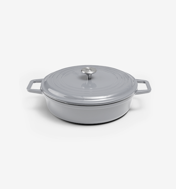 Grey enameled cast iron shallow casserole dish with lid and dual handles