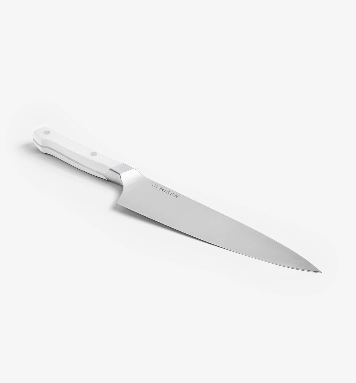Misen chef knife with white handle and stainless steel blade