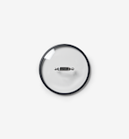 Glass pot lid with stainless steel handle and black silicone rim, top view