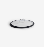 Glass pan lid with black silicone rim and stainless steel handle