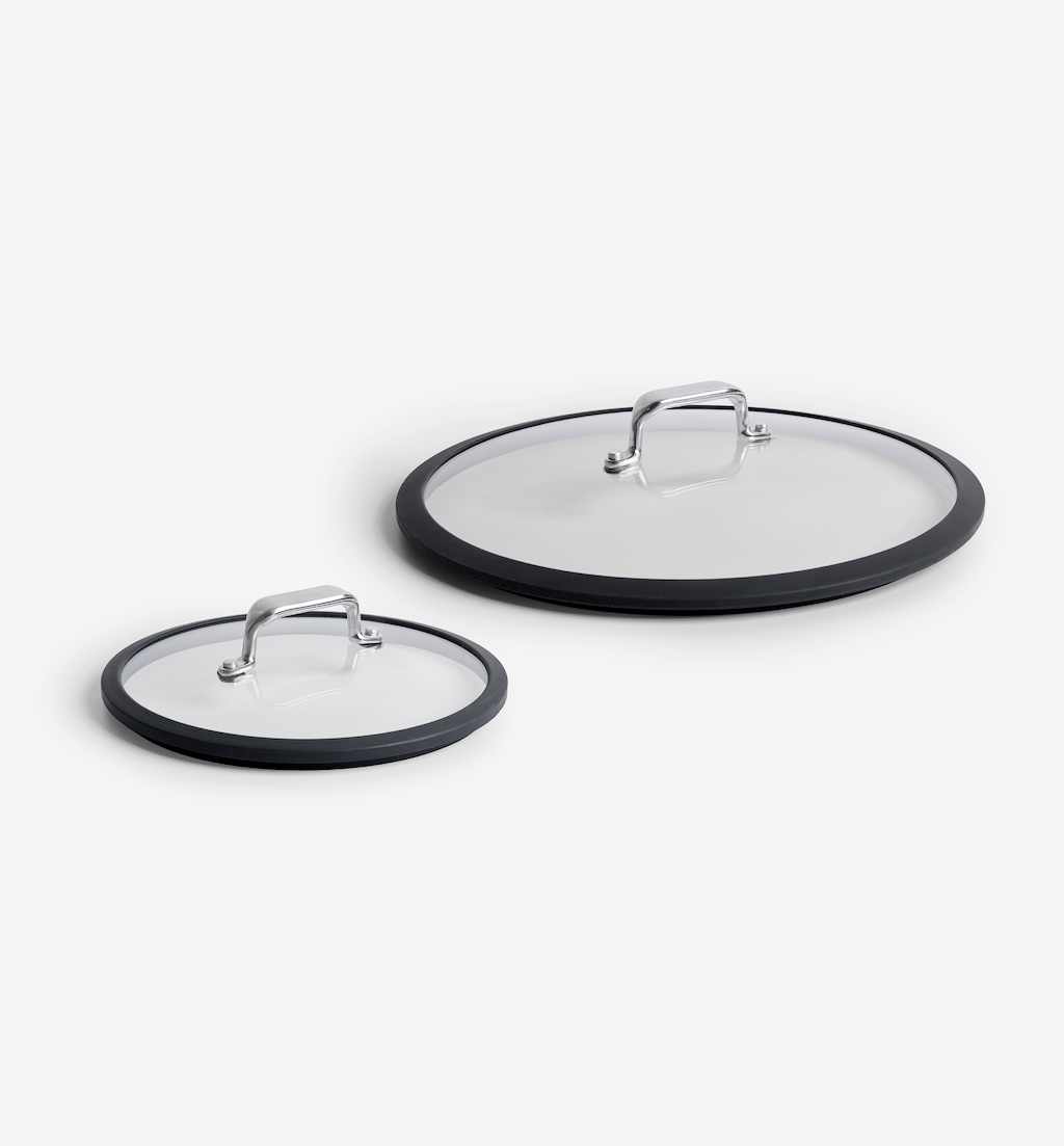 Glass cookware lids with silicone rim and stainless steel handle, two sizes