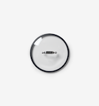Glass cookware lid with stainless steel handle and black silicone rim, top view