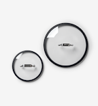 Two glass pot lids with black rim and stainless steel handle, small and large sizes