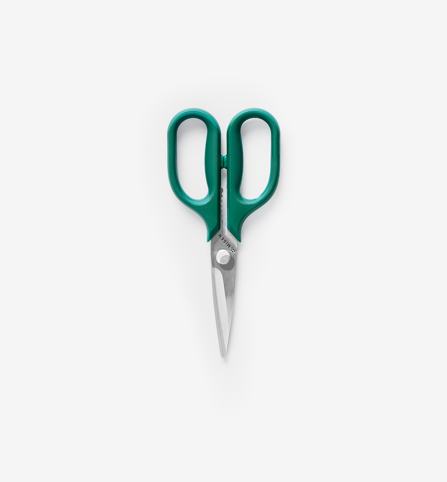 Misen kitchen scissors with teal green handles and stainless steel blades