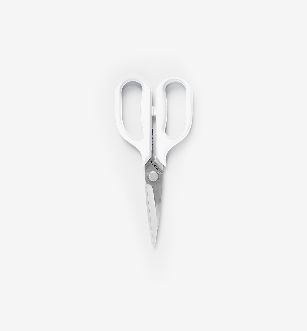 Misen kitchen shears with white handles and stainless steel blades