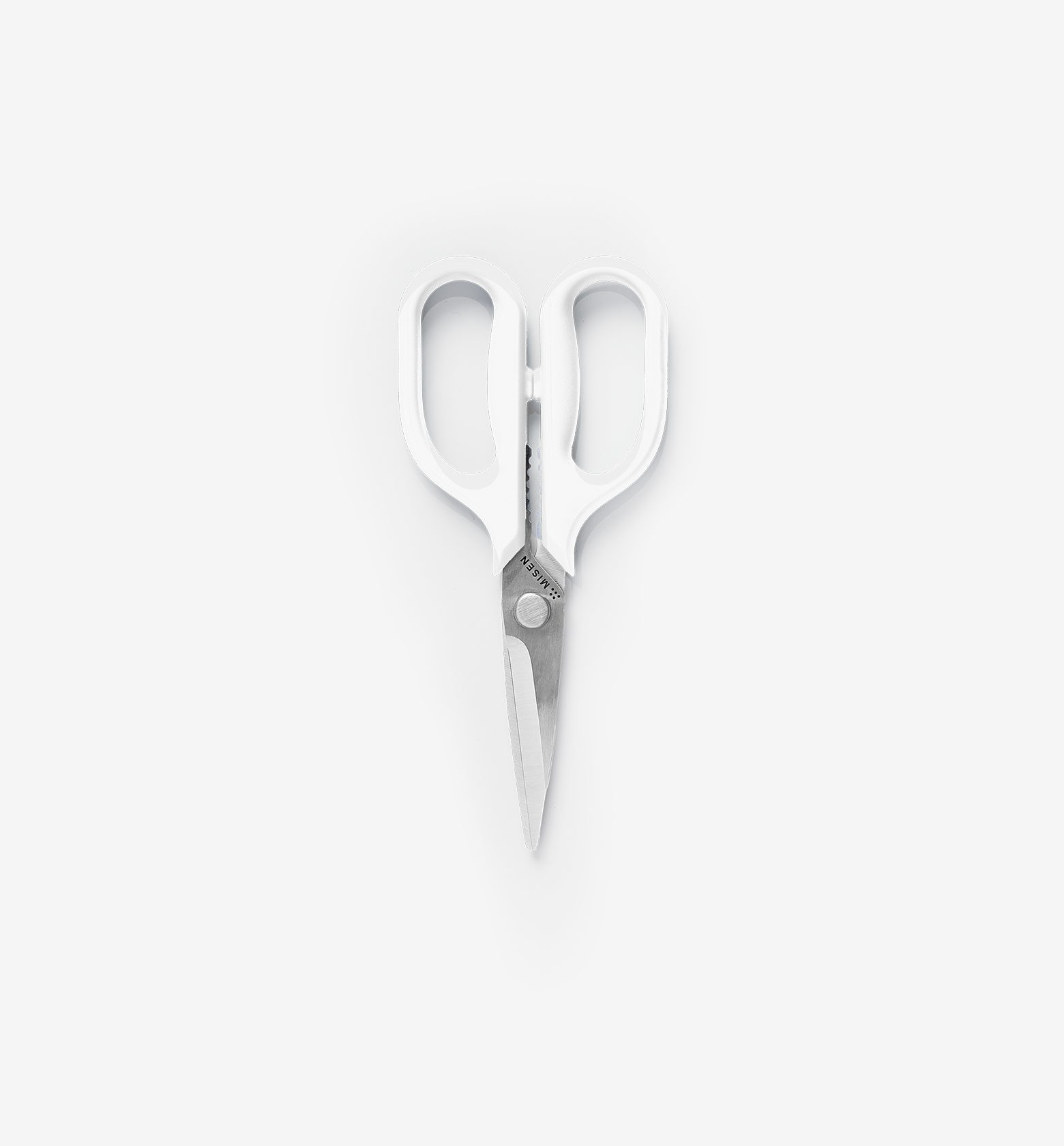 Misen kitchen shears with white handles and stainless steel blades
