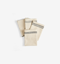 Cream linen kitchen dish towels with black stripes, set of four folded