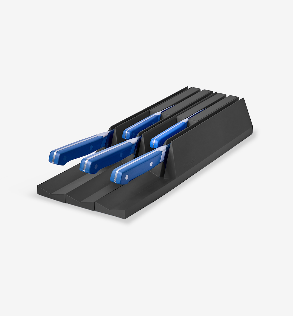 Black in-drawer knife organizer holding four blue-handled kitchen knives
