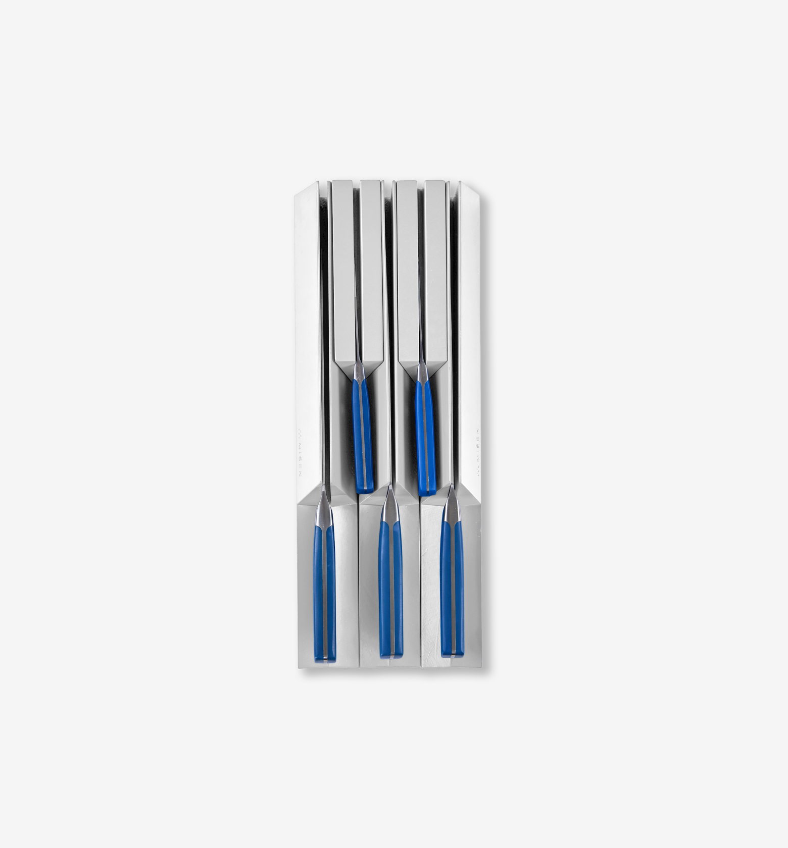 Set of four steak knives with blue handles stored in a stainless steel knife block drawer organizer