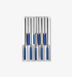Set of knives with blue handles stored in a stainless steel knife block organizer