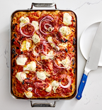 Detroit-style sheet pan pizza with mozzarella, salami, and red onion in Misen baking pan