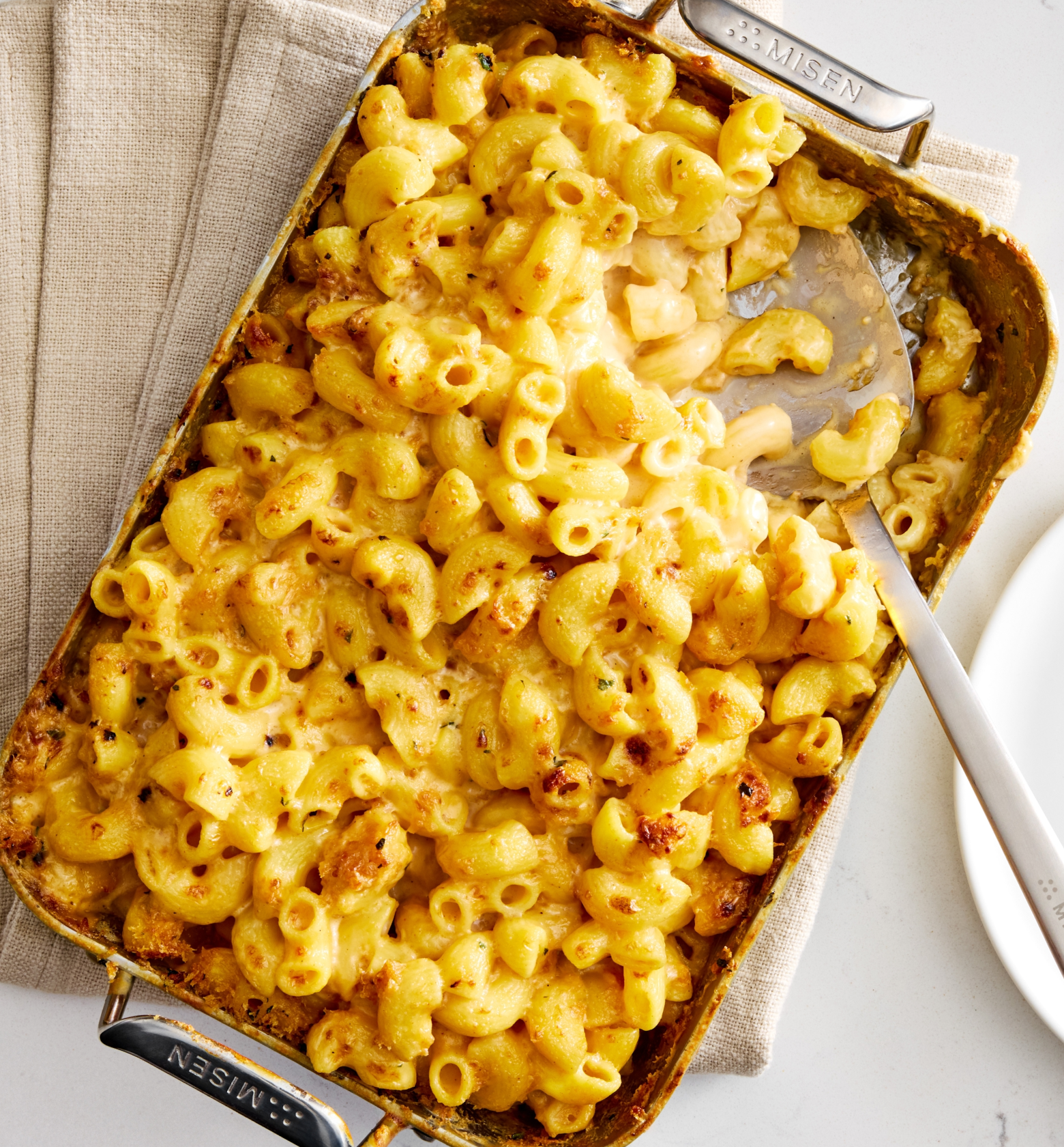 Baked macaroni and cheese in Misen roasting pan with golden crispy cheese topping
