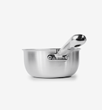 Misen stainless steel saucier pan with handle resting inside