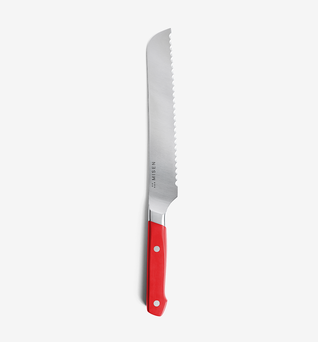 Misen bread knife with red handle and serrated stainless steel blade