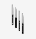 Set of 4 steak knives with serrated blades and black handles