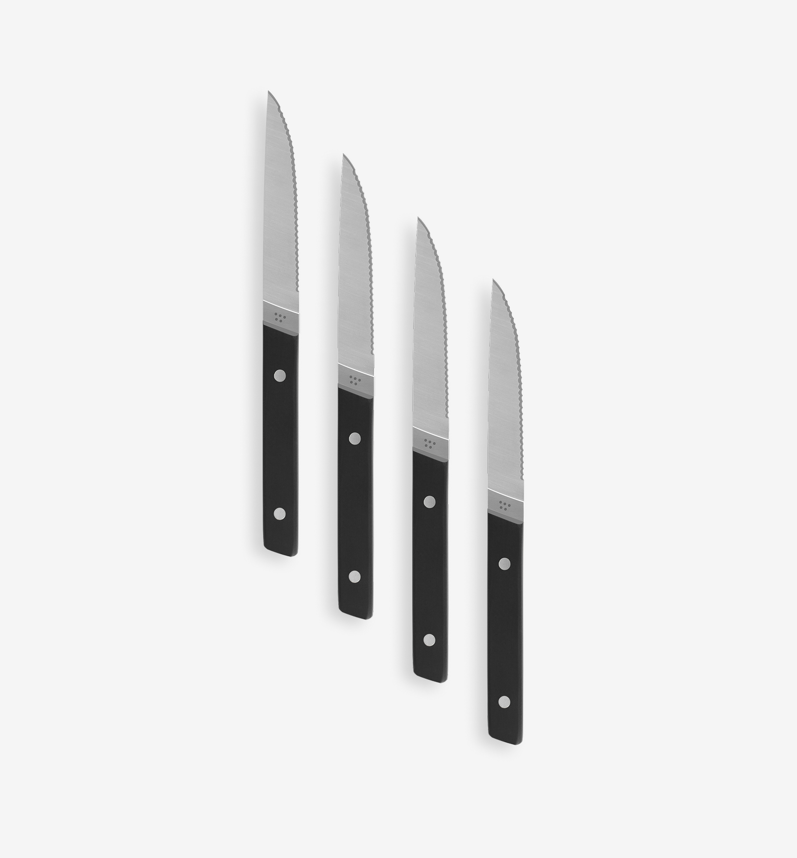 Set of 4 steak knives with serrated blades and black handles