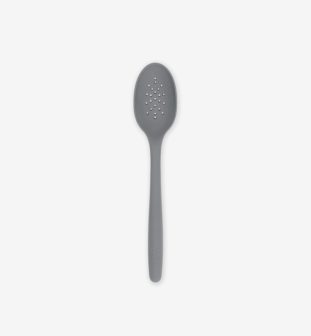 Gray silicone slotted spoon with perforated bowl and long handle