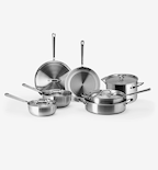 Stainless steel cookware set with pots, pans, and lids