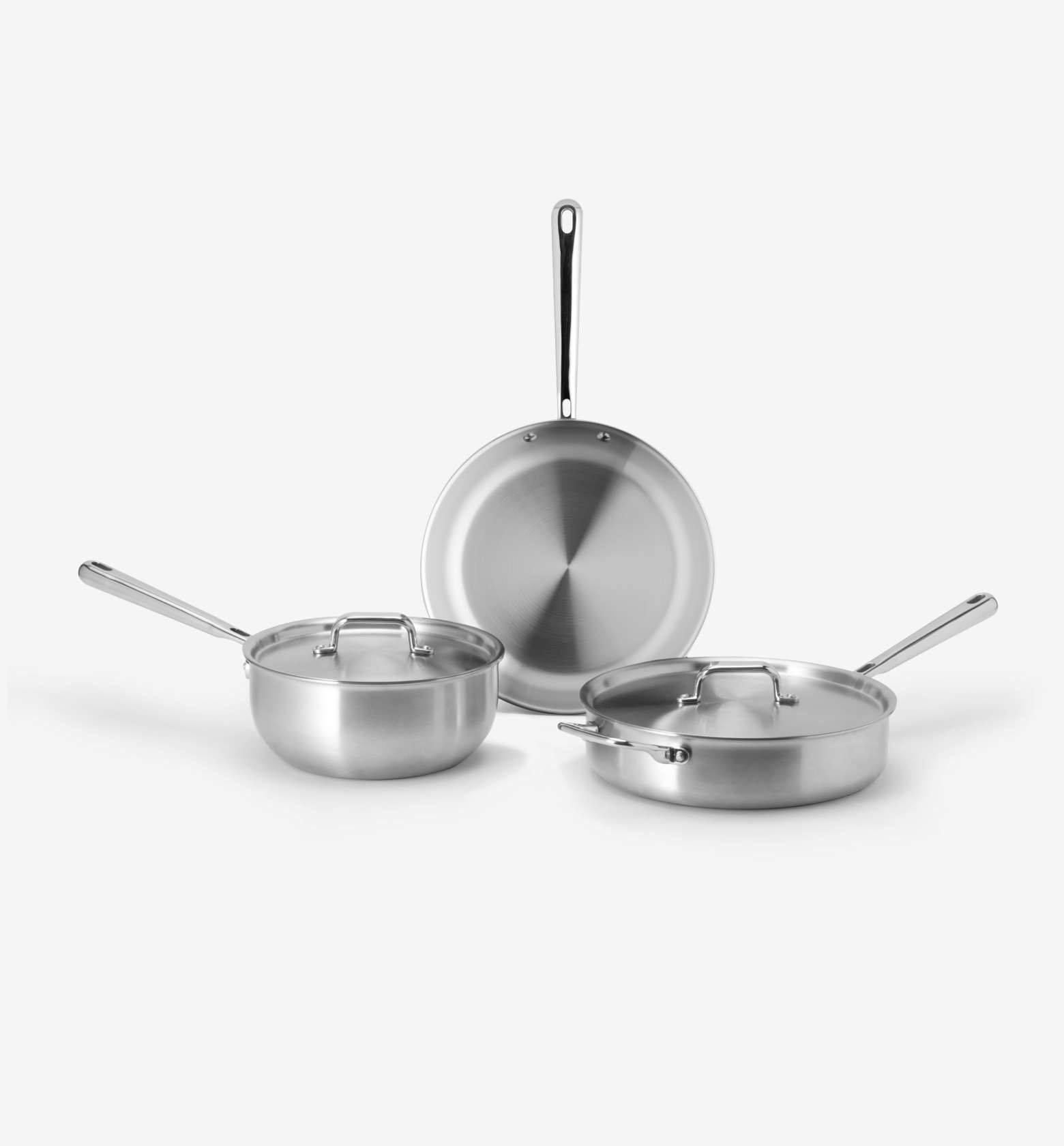 Stainless steel cookware set with frying pan, saucepan, and sauté pan with lids