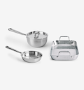 Stainless steel cookware set with saucepan, frying pan, and roasting pan