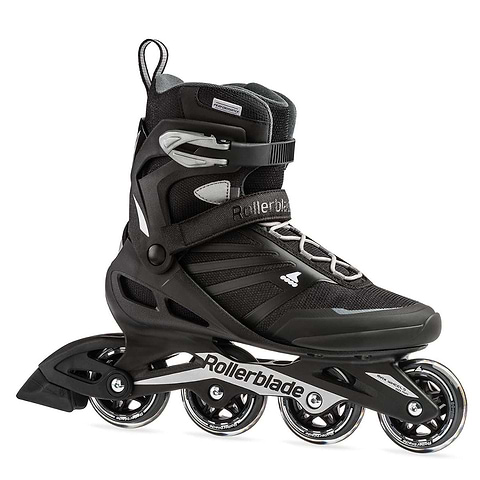 The Rollerblade 2022 Zetrablade Inline Skates in black and silver are stylish skates designed for beginner skaters, featuring four wheels, secured ankle support, and laces. The "Rollerblade" branding on the frame complements its modern design and robust construction, making it ideal for recreational use.
