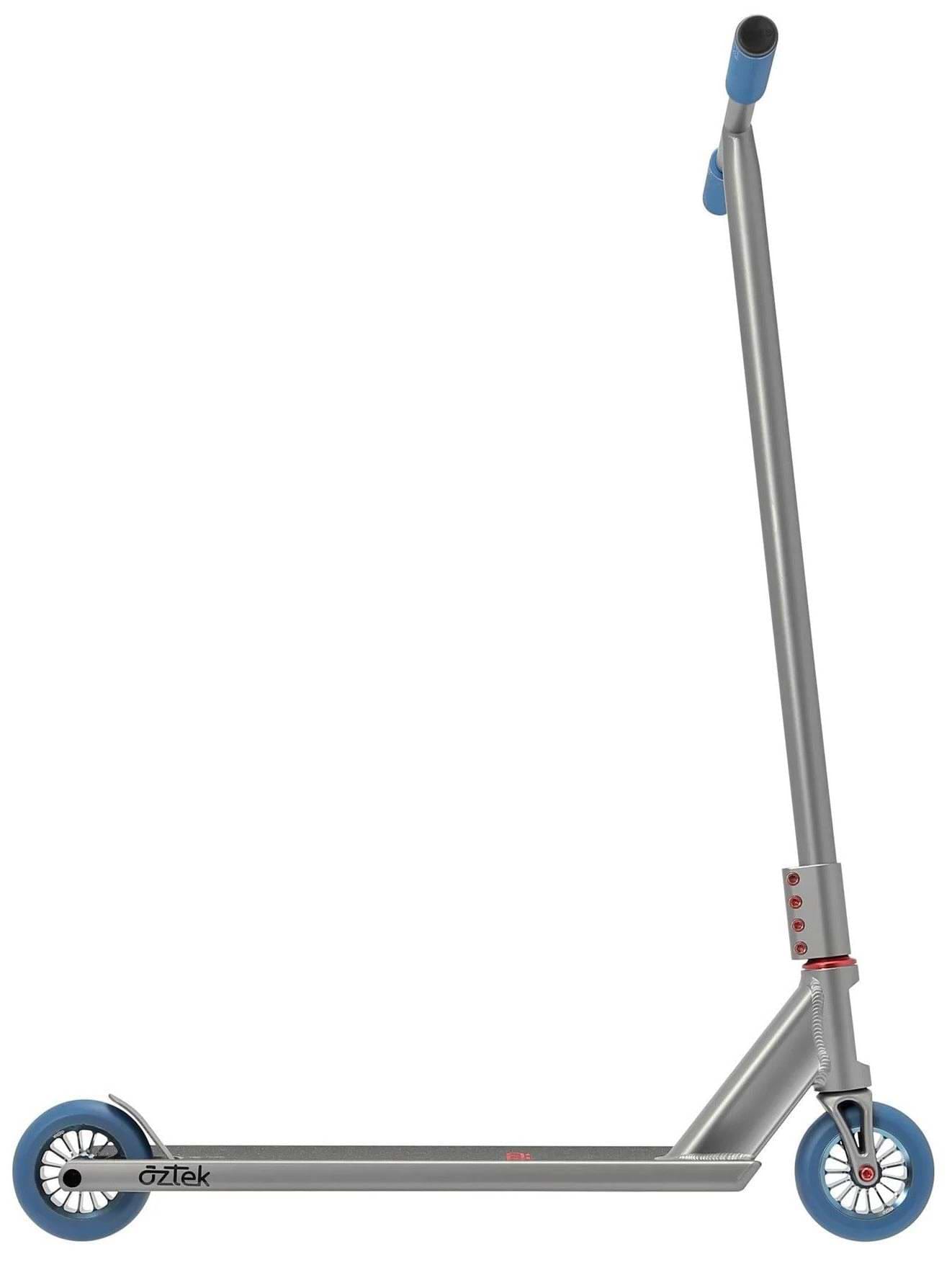 The Aztek Siren Complete Street Stunt Scooter in grey features blue wheels and handlebar grips with a minimalist design. This Aztek scooter is shown from the side against a white background.