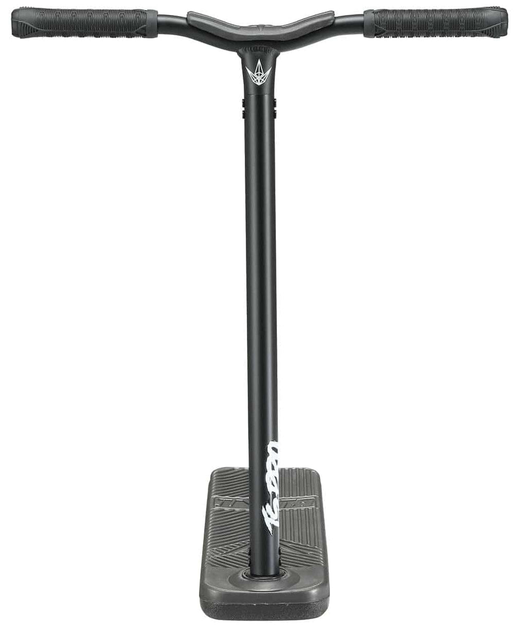 A front view of the Blunt Envy TS Pro 6 Indoor Trampoline Stunt Scooter in black showcases its wide handlebars and sleek design. The scooter boasts a textured footboard and a minimalist, modern appearance, making it ideal for those looking for both style and performance.