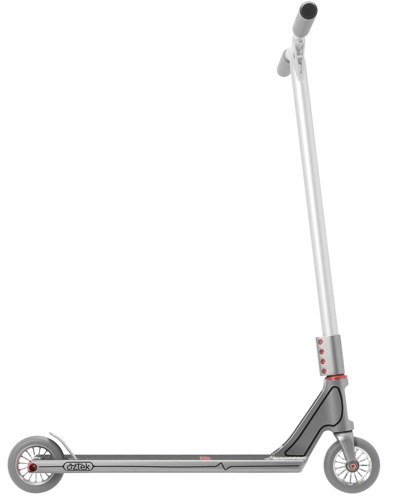 Side view of the Aztek Fountain Complete Stunt Scooter in grey by Aztek, featuring a minimalist slim deck, two small wheels, straight handlebar, and red accents—a sleek design perfect for city cruising or skatepark tricks.
