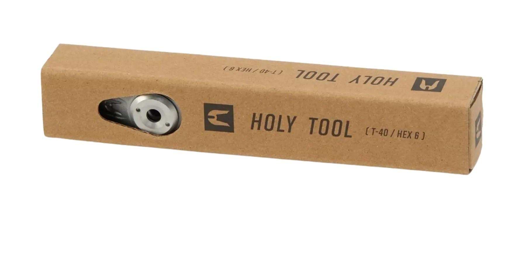 A brown rectangular box labeled "Ethic Holy Scooter Tool T40" with a cutout showing part of the high-quality Ethic multi-tool for scooters inside.