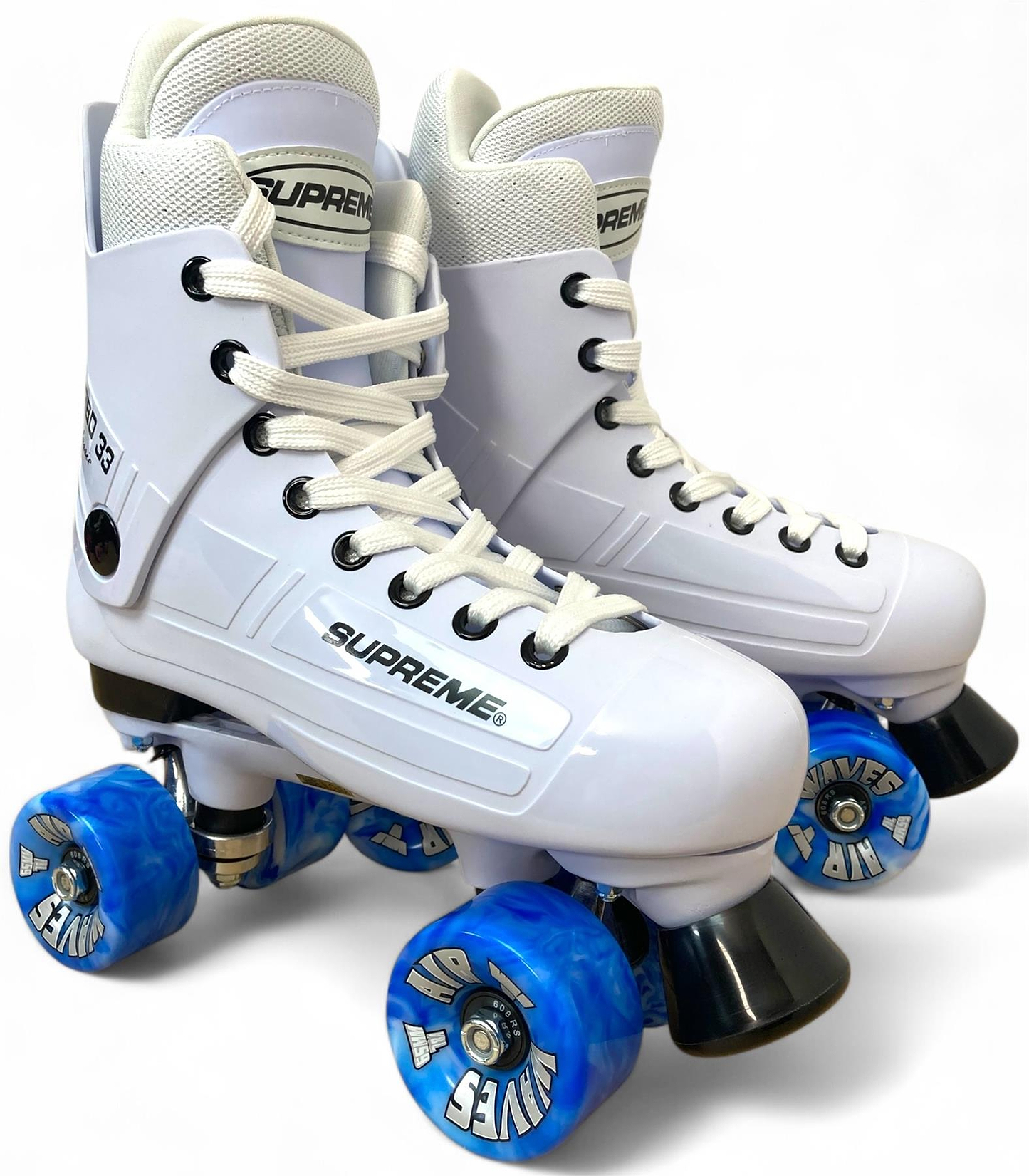 A pair of Supreme Turbo 33 Nylon Quad Roller Skates in white with blue swirl wheels and white laces, featuring "SUPREME" branding on the side, shown against a plain white background.