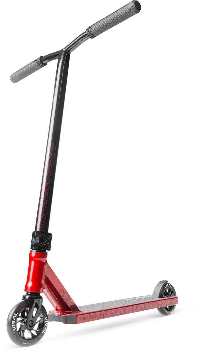 The Madd Gear Viral Purge Complete Stunt Scooter - Cherry by MGP features a wide handlebar, two small wheels, and a textured foot deck—ideal for skatepark tricks. It stands upright on a white background in striking red and black.