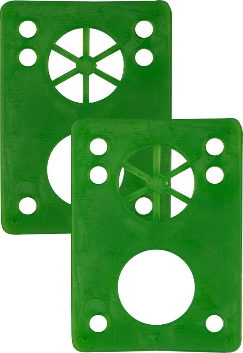 Two Essentials Skateboard Riser Pads in green, shaped as rectangular plastic plates with circular cutouts and holes, each showcasing an eight-spoke design in the top circle and a large round cutout at the bottom. These 1/8" riser pads by Essentials are placed side by side with a slight overlap.