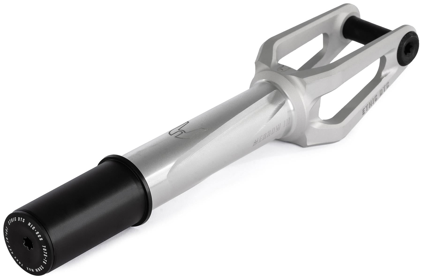 The Ethic DTC Merrow V3 8/12STD HIC Stunt Scooter Forks in raw silver feature a two-pronged design and a cylindrical black axle mount, shown angled on a white background. Brand: Ethic.