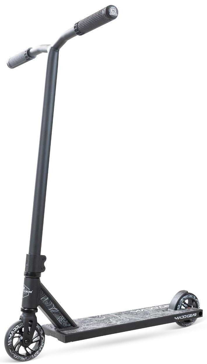 The Madd Gear MG 4 Titan Complete Stunt Scooter - Black by MGP features a wide handlebar, textured deck, small wheels, and a sleek design—ideal for freestyle tricks and shown angled against a white background.