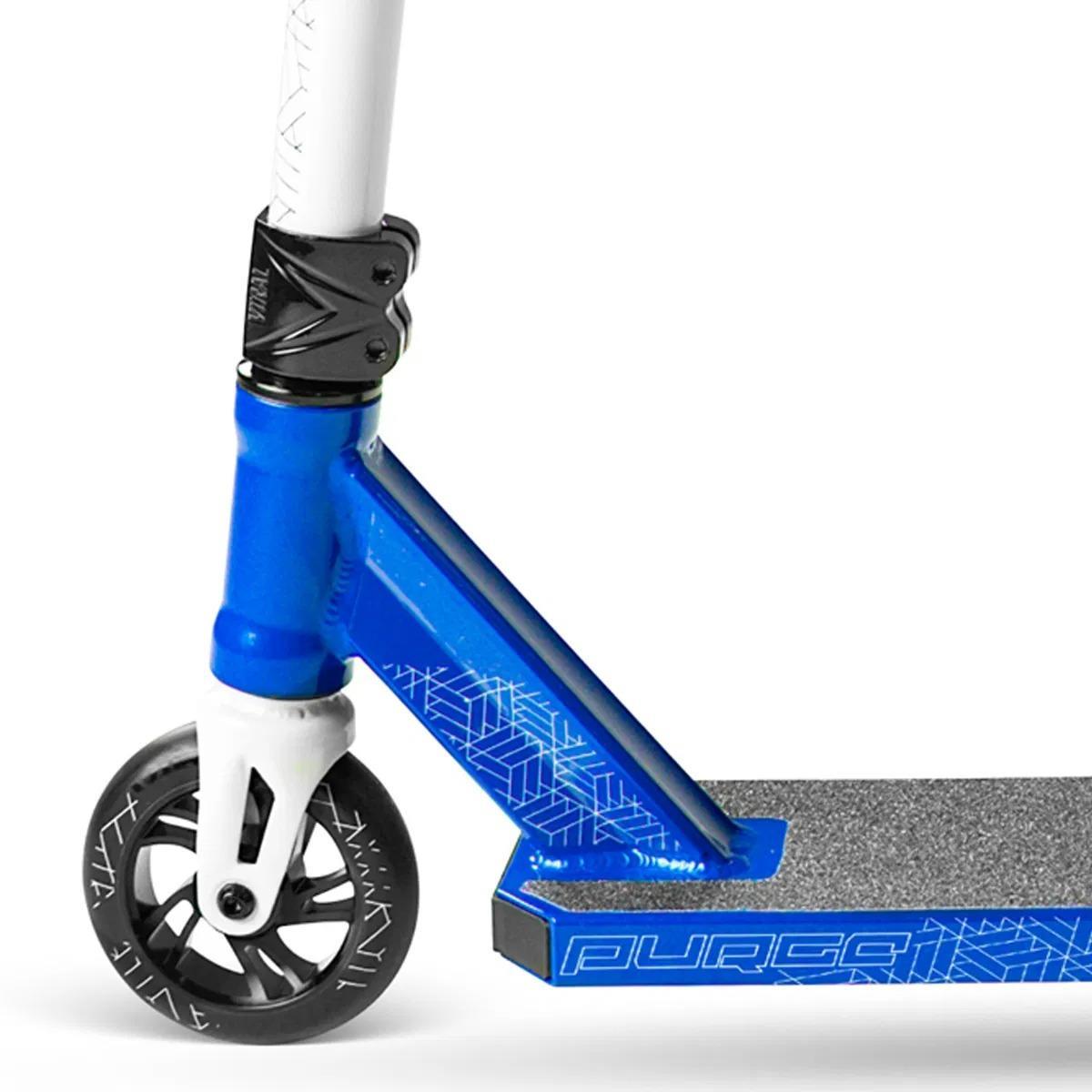 Close-up of the Madd Gear Viral Purge Complete Stunt Scooter in Cobalt, featuring blue and white details, front wheel, grip tape with "PURGE," and sturdy handlebars—ideal for mastering tricks at your local skatepark.