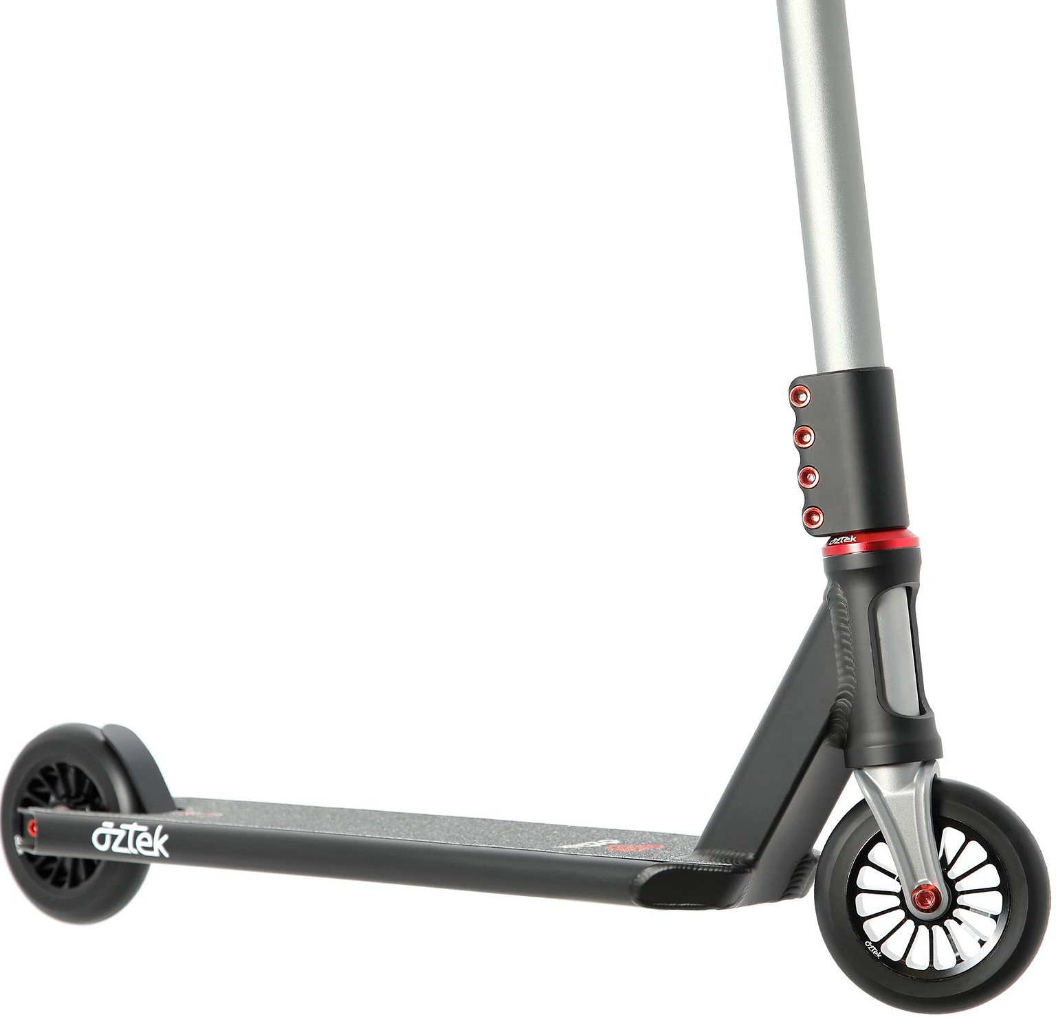 A close-up of the Aztek Corsa 2026 Complete Stunt Scooter in Satin Black captures the deck, front and rear wheels, and a portion of the handlebar. This lightweight stunt scooter showcases red accents, with the Aztek branding clearly visible on the deck—emphasizing its quality craftsmanship.