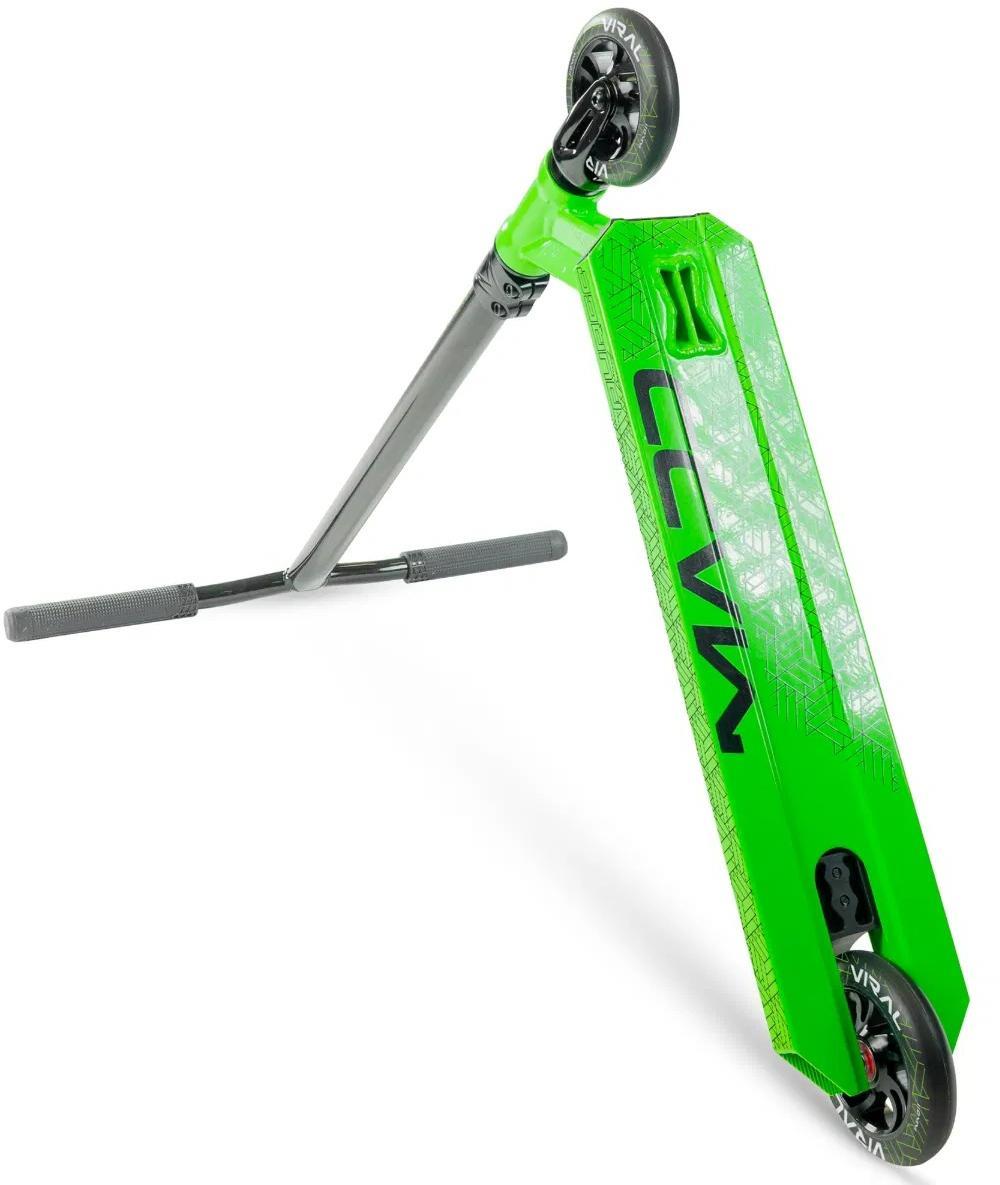 The Madd Gear Viral Purge Complete Stunt Scooter - Jade is shown from a tilted angle, featuring "ENVY" on the deck, black handlebars extended sideways, and black wheels with white accents.