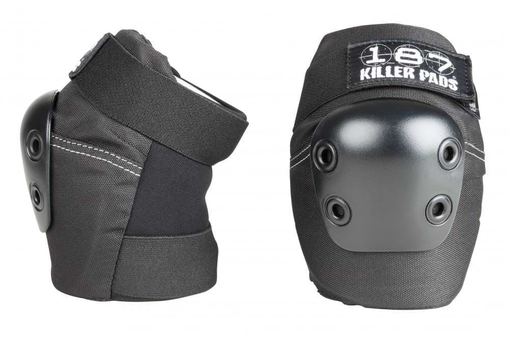 Two elbow pads in black, designed for skate protection, ensure high performance and safety with their hard, metallic dome. One pad is depicted from the side to showcase its adjustable straps that provide superior comfort, while the other pad is presented from the front displaying the "187" logo.