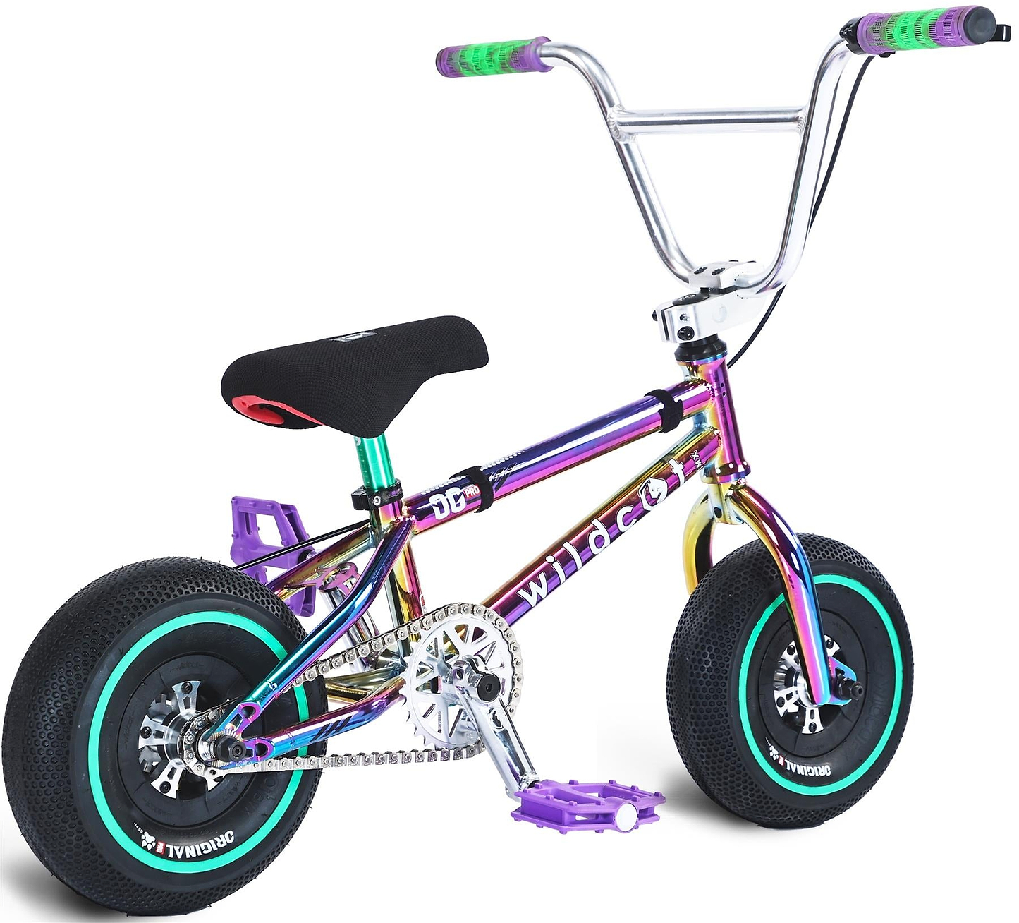 The Wildcat OG Pro Mini BMX Bike - Joker Green Neochrome is a small, colorful BMX with a shiny iridescent frame, black seat, thick black tires with teal rims, purple pedals, green-and-purple handlebar grips, and "wildcat" on the frame.