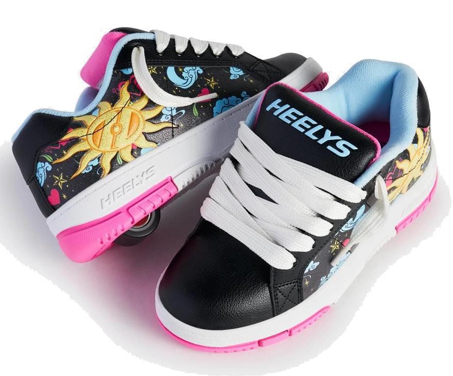 The Heelys Kolect Prints Girls Shoes in black, blue, and neon pink feature celestial sun, moon, and star prints and a hidden wheel in the heel.