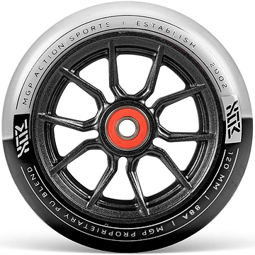 A black and white Madd Gear MFX Syndicate AR120 Dual Urethane stunt scooter wheel with branding and "MGP ACTION SPORTS | ESTABLISHED 2002" text along the rim.
