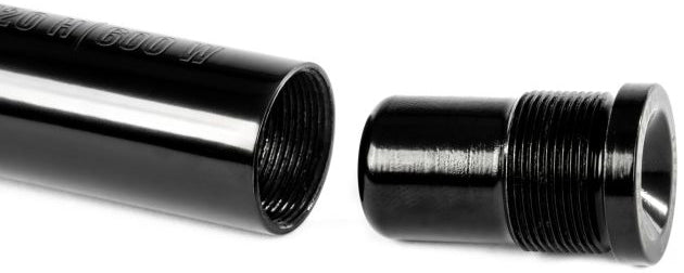 A close-up view of the Ethic DTC Handlebar Balance Point Modulation - 150g shows a black metal pipe with internal threads alongside a coordinating threaded cap, both precisely aligned for assembly—perfect as a scooter bar end to fine-tune balance points, crafted to Ethic’s renowned quality standards.