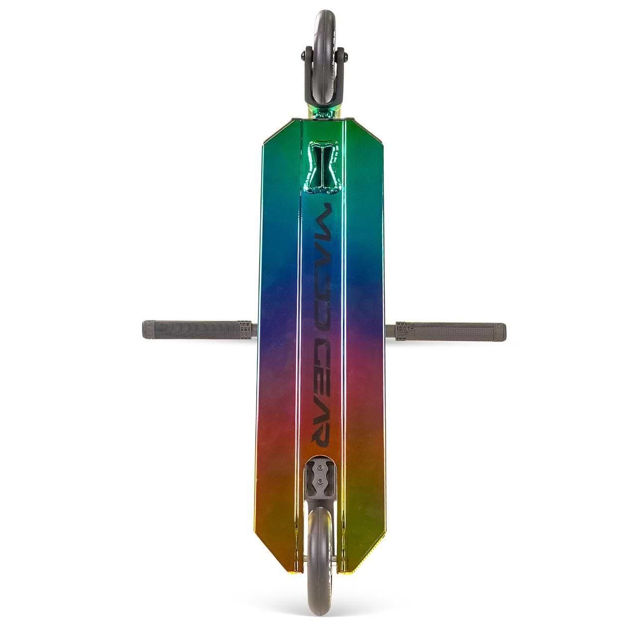 The Madd Gear MG 6 Kinetic Complete Stunt Scooter in Neochrome/Black features a shiny, rainbow-colored aluminium deck with "Madd Gear" branding and two outward-extending handlebars, viewed from above.